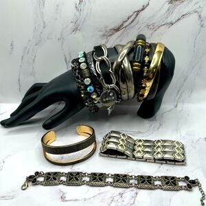 Set of 10 silver and gold tone black bracelets